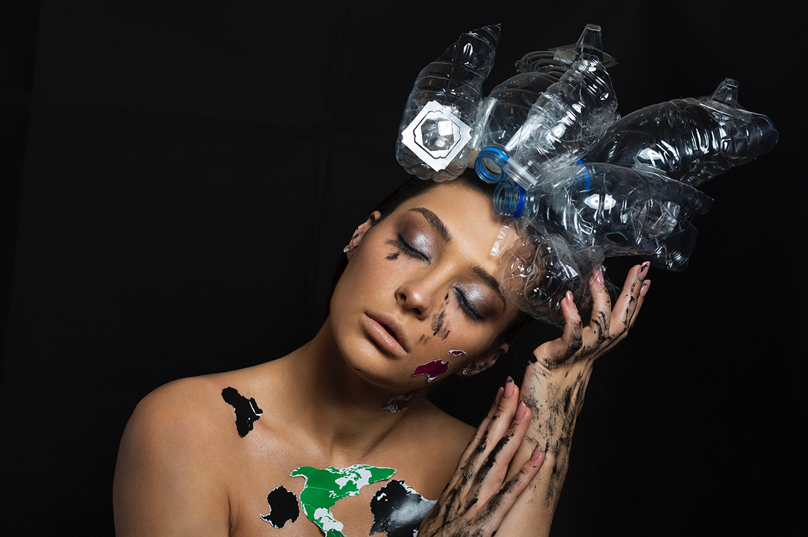 lady with plastic bottles in hair