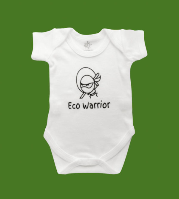 White baby short sleeve bodysuit with the words eco warrior and a picture of a ninja warrior printed on the front, set on a green background